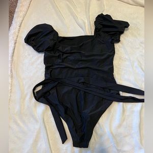 Women’s cap sleeved bathing suit with waist tie